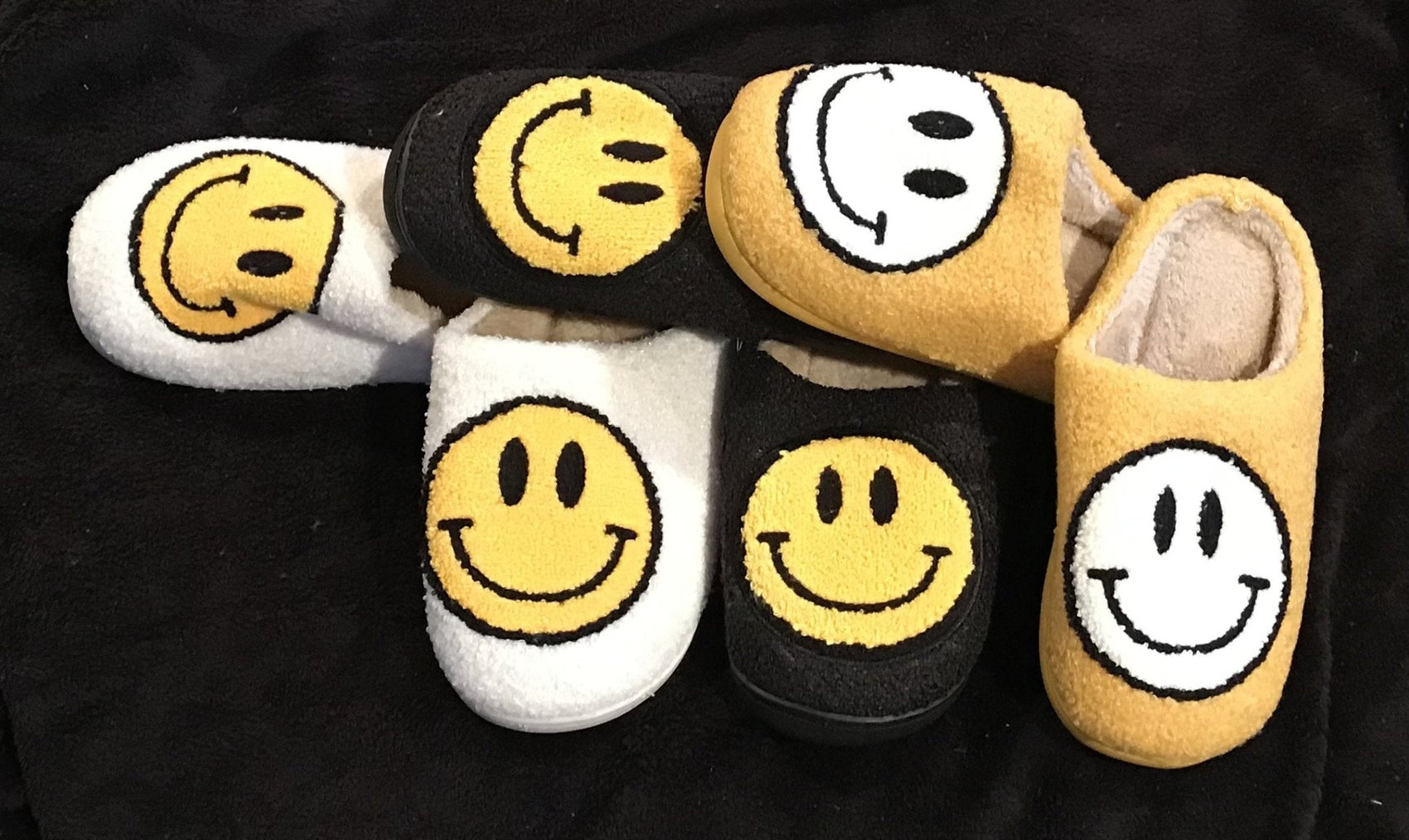 Pretty Simple brand. Soft material interior and exterior with big happy faces. Medium 7-8, Large 9-10. $15