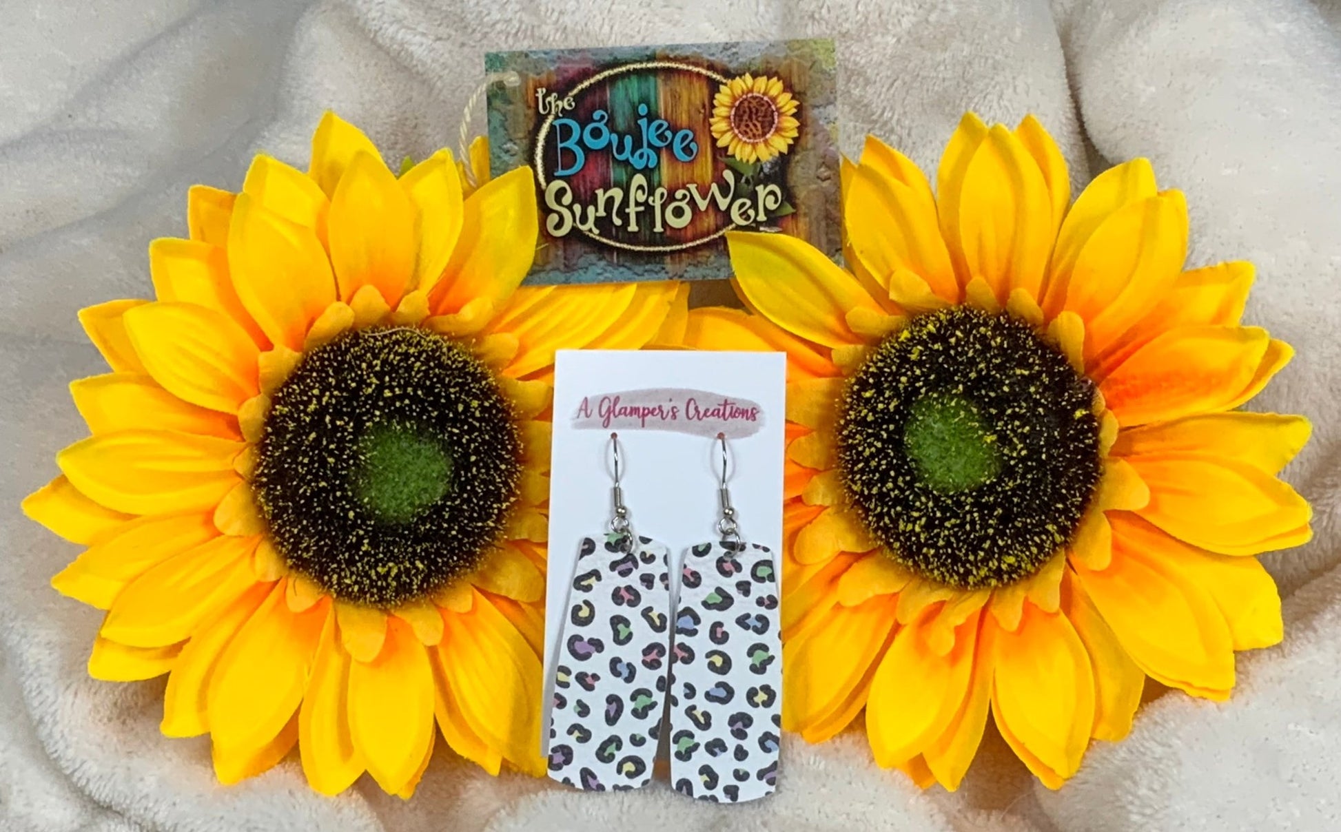 A Glamper's Creation, LLC brand. Genuine leather colorful leopard silver dangle earrings. $8