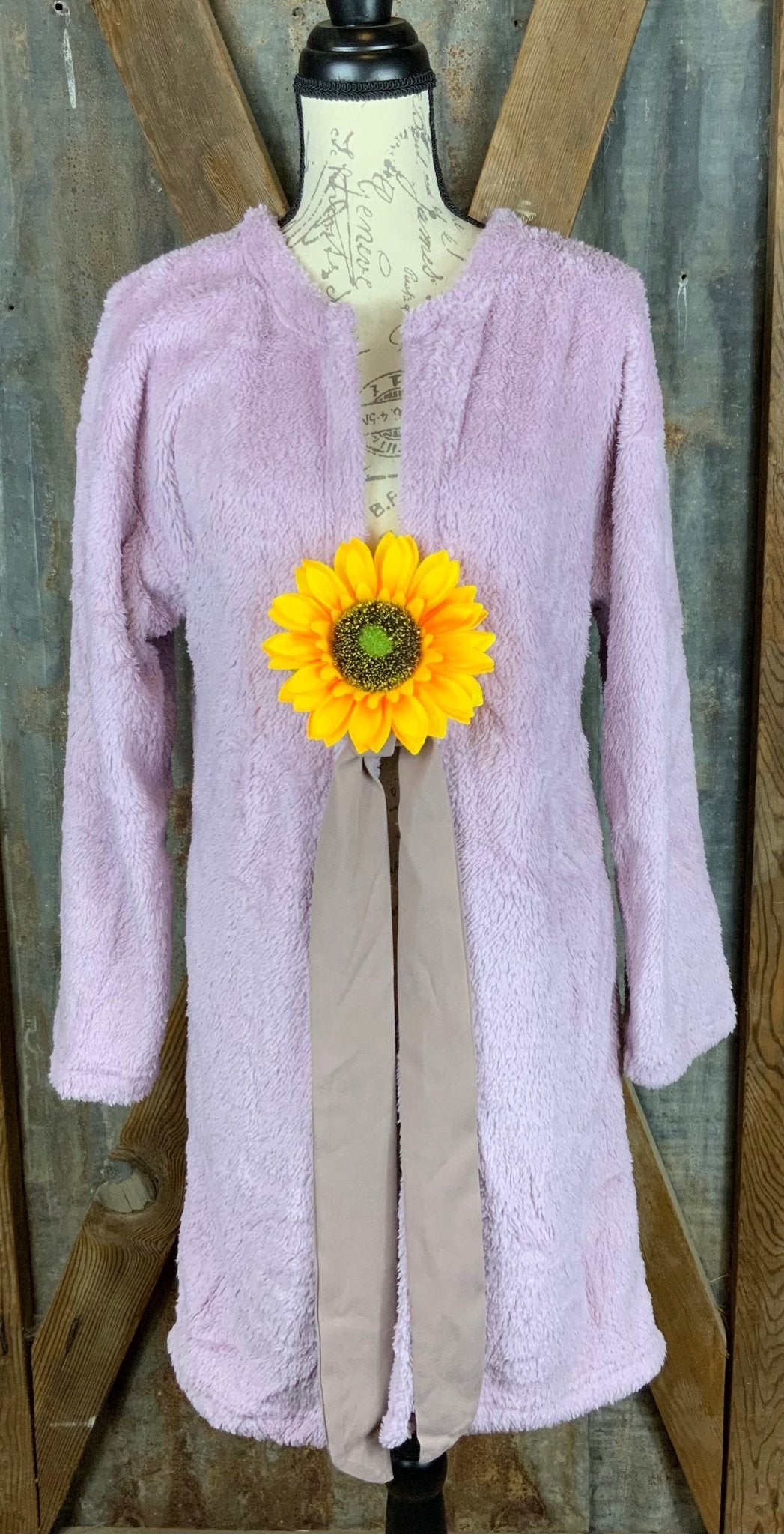 Melody brand. Mid-length, open front, ribbon tie fleece wrap in Lavender.  S, M, L $35