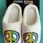 Living Royal brand. These slippers feature white soft interior and exterior material, colorful peace sign and white hard rubbler soles for indoor/outdoor wear. S/M fits a women's 5-8. M/L fits a women's 9-12. Unisex. 100% polyester. Machine washable. $22