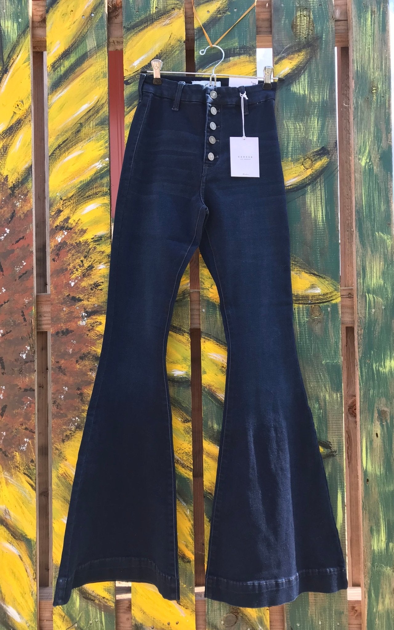 KanCan brand. These stretchy super flare jeans feature a wide hem height, hidden waist band with exposed button fly.   $32