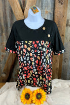 Celeste Clothing brand. This raglen contrast top has black and colorful leopard print and button accents. M, L $16