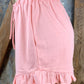 Main Strip brand. Drawstring tie waisted shorts with ruffled bottom hem. Loose fit. Available in Dusty Rose and Black.