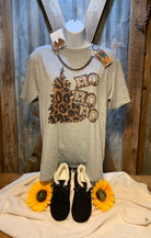 GLITTER AND GLAM brand. Leopard tree with faux lighted "Ho, Ho, Ho" letters on a soft heather gray tee. XL and 2X. $24.50