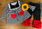 Yawoo Garments brand. Toddler. Black and white striped top with bibbed color, red buttons and heart detail and ruffled sleeves. Black leggings with red tiered ruffled bottoms. Sizes: 3T, 4T, 5-6T. $20