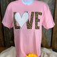 Shop Southern Belle brand. Valentine tee with leopard letters in Light Pink or Black tee with either a white or red sequined heart. S, M, L. $20