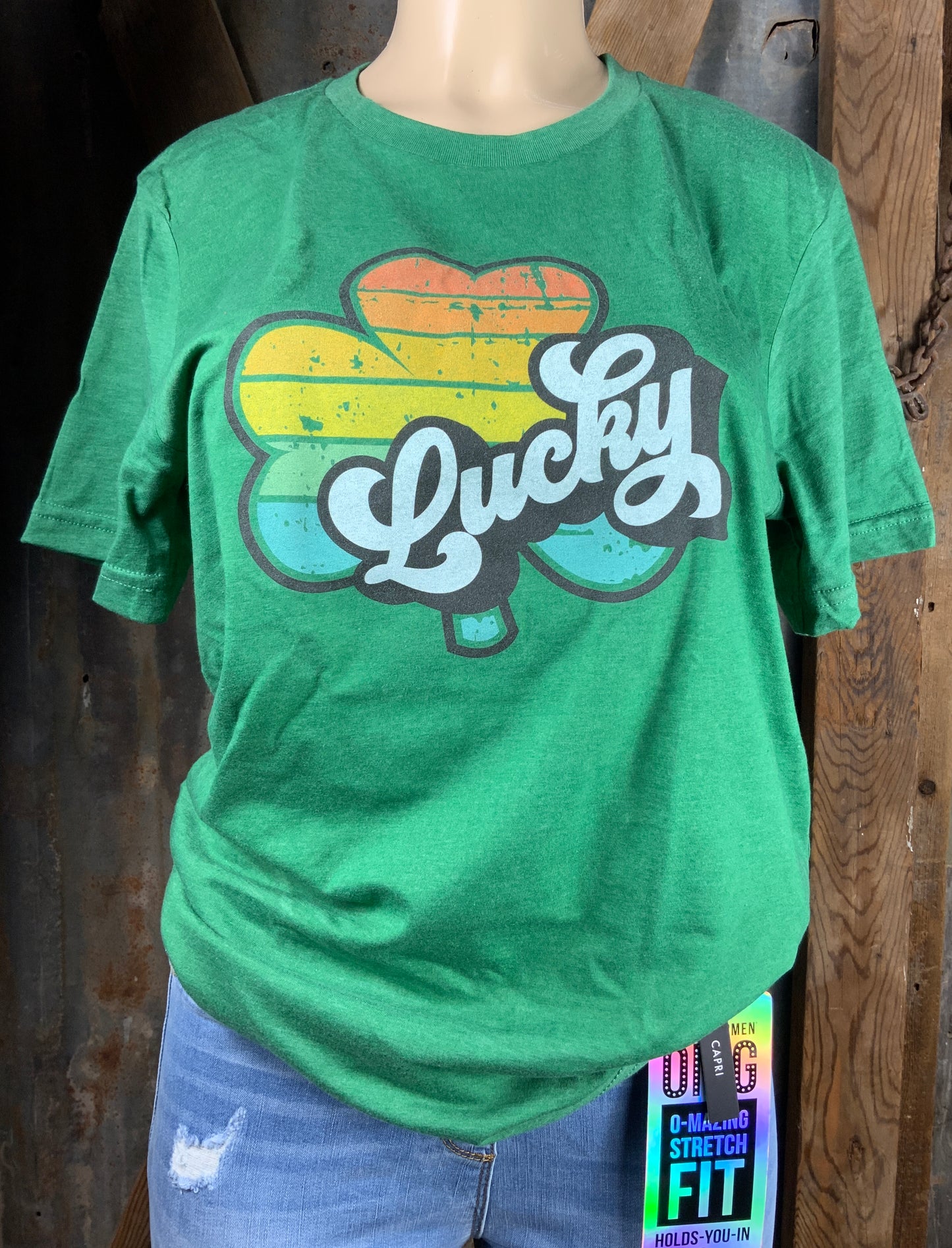 Olive And Ivory Wholesale brand. Retro designed lucky tee with rainbow shamrock graphic with bold black and white letters. S, M, L, XL. $18