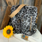 LivFoxy brand. Gray leopard backpack with strap and zippered outer pockets. Tan accented color. Gold hardware. $25